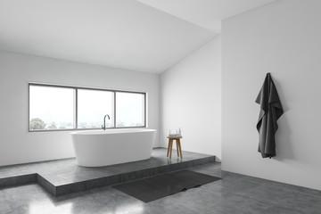 White bathroom corner with bathtub