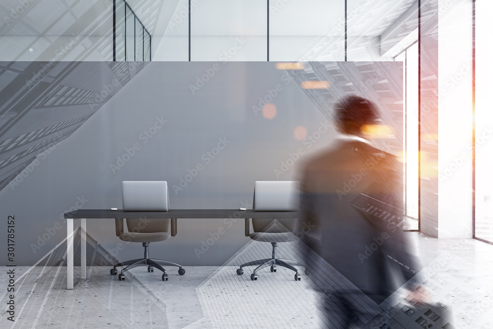 Wall mural businessman in gray space office