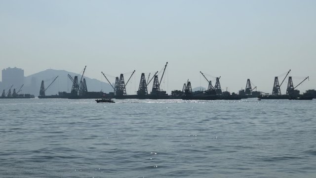 a row of jib boats at sea