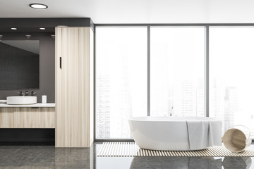 Gray tile panoramic bathroom, sink and tub