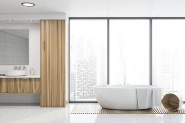 Fototapeta na wymiar White tile panoramic bathroom, sink and tub
