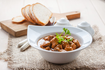 Goulash soup with pork and mushrooms.