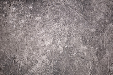 Texture and background of an old black and gray concrete wall. Cement