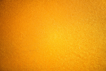 Fototapeta premium Texture of painted gold cardboard. Background
