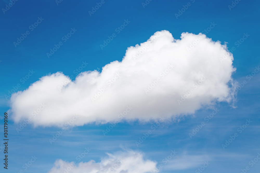 Wall mural big white fluffy cloud in blue sky in clear sunshine day