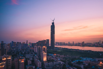 Fototapeta na wymiar Wuhan skyline and Yangtze river with supertall skyscraper under construction in Wuhan Hubei China.
