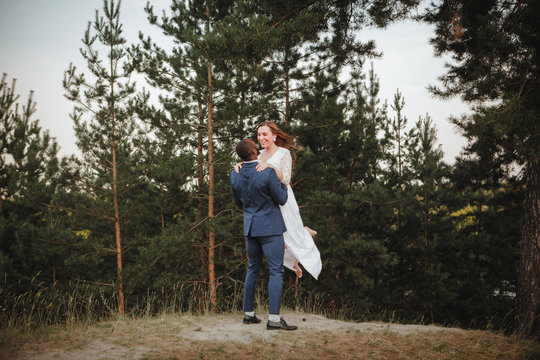 beautiful mixed couple of newlyweds