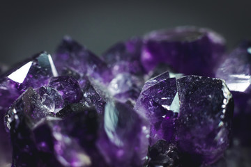 amethyst with light shine on, on black background