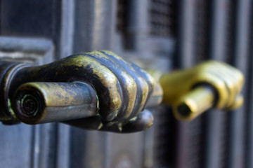 Two metallic doorknobs from the entrance door of the Real Gabinete de Literatura Português, Rio de Janeiro, Brazil