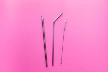 Flat lay of sustainable products stainless straw on color background, environment and eco concept.