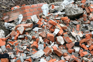 Construction waste with elements of various dismantled and destroyed old structures at municipal...
