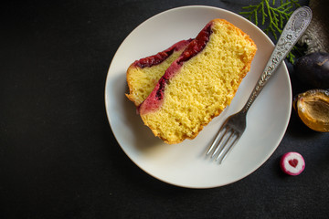 plum pie (delicious dessert, pastries with fruit) menu concept. food background. copy space. Top viev