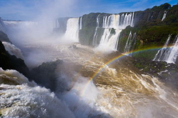 Rainbow over Cataratas del Iguazu waterfall, Brazil