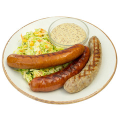 fried sausages with salad without a background on a plate