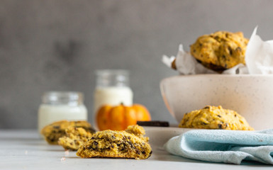 Freshly baked pumpkin cookies with oatmeal and chocolate chips. Healthy snack for breakfast. Fall pumpkin cookies.