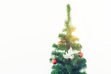 Decorated Christmas tree and gifts on white background with copy space