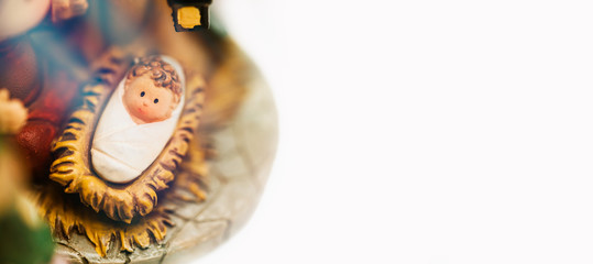 Christmas nativity scene of born child baby Jesus Christ in the manger with Joseph and Mary in Bethlehem.Traditional Christmas Nativity Scene of baby Jesus in the manger.Christianity Bible story.