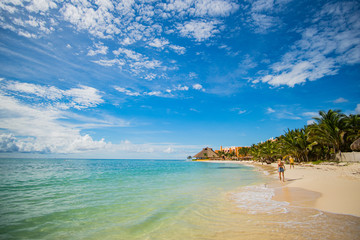 Naklejka na ściany i meble Beautiful mexican beach and sky at Caribbean Sea