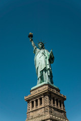 Fototapeta na wymiar Statue of Liberty, beautify lit on a sunny day