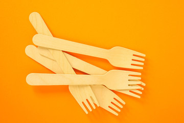 cutlery wooden, craft paper (eco friendly forks, plates, biodegradable materials) food containers eco packaging, concept. food background. copy space