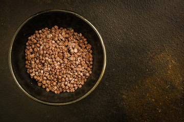 chocolate drops (black or milk chocolate, sweet ingredient) menu concept. food background. copy space. Top view