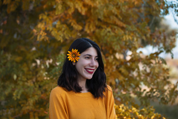 young woman in autumn park