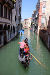 Fototapeta na wymiar Gondola on Venice Canal