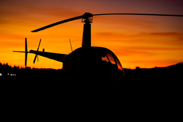 Helicopter Silhouette at Sunset © Brett