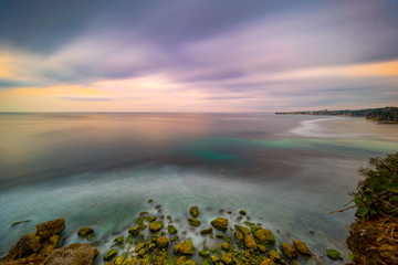 Long exposure dramatic tropical sea and sky sunset