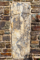 Stone slab, built into the churchyard wall of the Church of St. Martin in Meyerode, Amel Municipality, Belgium