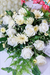 Valentines day background. Beautiful bouquet of roses on wooden table . Luxury bouquet made of red roses in flower shop Valentines Bouquet of red roses.  Rose bouquet. Soft focus of a Rose .