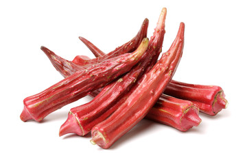 Red okra on white background