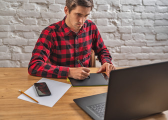 civil engineer at his Desk working with documents