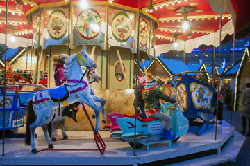 Fototapeta na wymiar little outdoor carousel in Dusseldorf