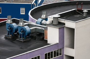 The external units of the commercial ventilation systems are installed on the roof of an industrial...