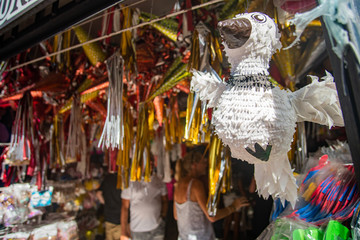 Fototapeta na wymiar Pinata Store selling Pinatas in colonial City Valladolid in Mexico