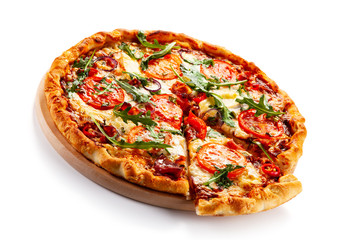 Pizza with ham, rucola, and vegetables on white background