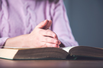 prayer woman hand on Bible