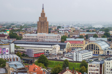 Aerial view of Latvian Academy of Sciences, Riga Central Market, Bus station and Riga Old Town ...