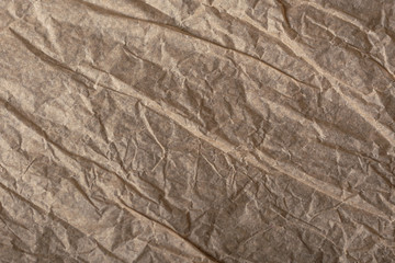 crumpled parchment paper texture with shadows