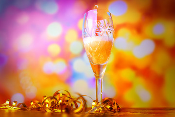 Christmas and New Year celebration with champagne. Christmas Golden lights. Celebration.