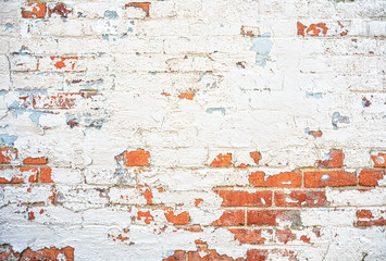 Terra cotta red brick wall white and blue peeling paint background
