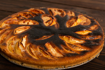 failed apple pie. burnt on top and the dough did not rise during baking. textured burnt pie crust....