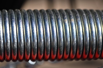 Partial view of a steel spring.