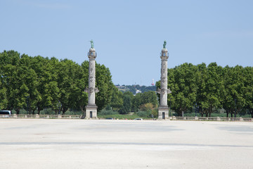 Fototapeta na wymiar Bordeaux columns in square place des Quinconces France
