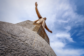 Jesus Christ at the top of Temple Sacred Heart of Jesus on Mount Tibidabo, Barcelona, ​​Spain.