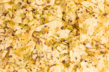 healthy snack of crisps with chickpea, green and yellow peas and black beans