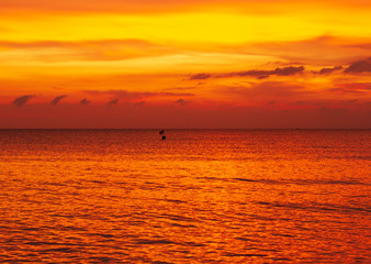 A sunset view from a boat at the sea