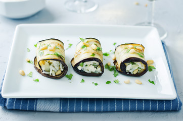 Rice pine nuts cilantro goat cheese stuffed eggplant rolls