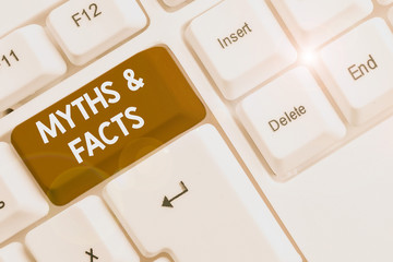 Writing note showing Myths And Facts. Business concept for usually traditional story of ostensibly...